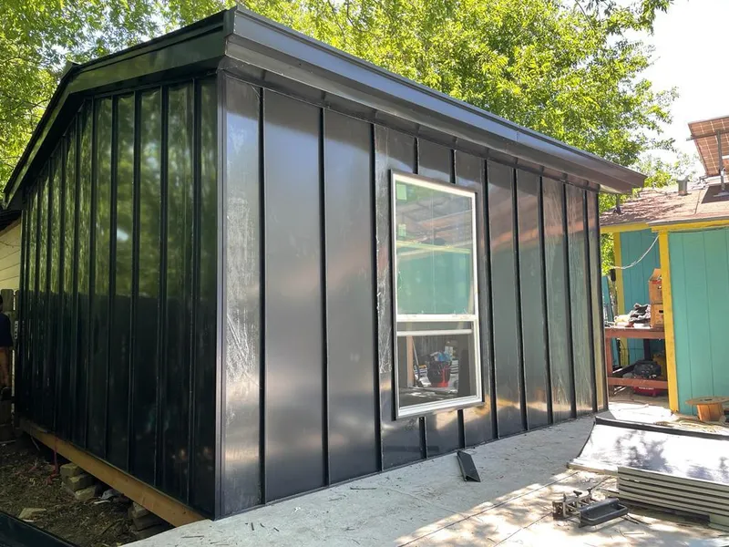 Black standing seam metal wall panels for Roof Inspection in Catoosa